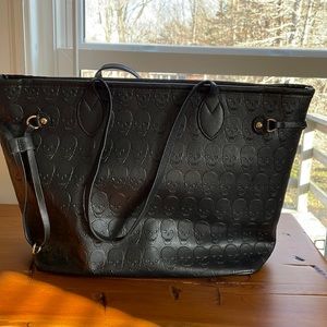 Skull embossed tote